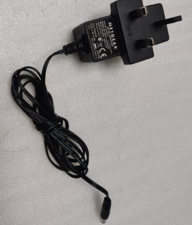 *Brand NEW*Netgear 12V 1.0A 12W AC-DC Adapter Black UK Plug MV12-Y120100-B2 Power Supply - Click Image to Close